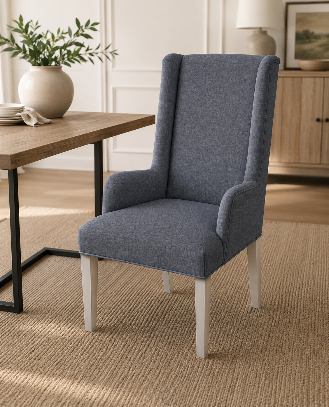 Lyons Host Chair in Sugarshack Blue — deep blue upholstery, exposed legs