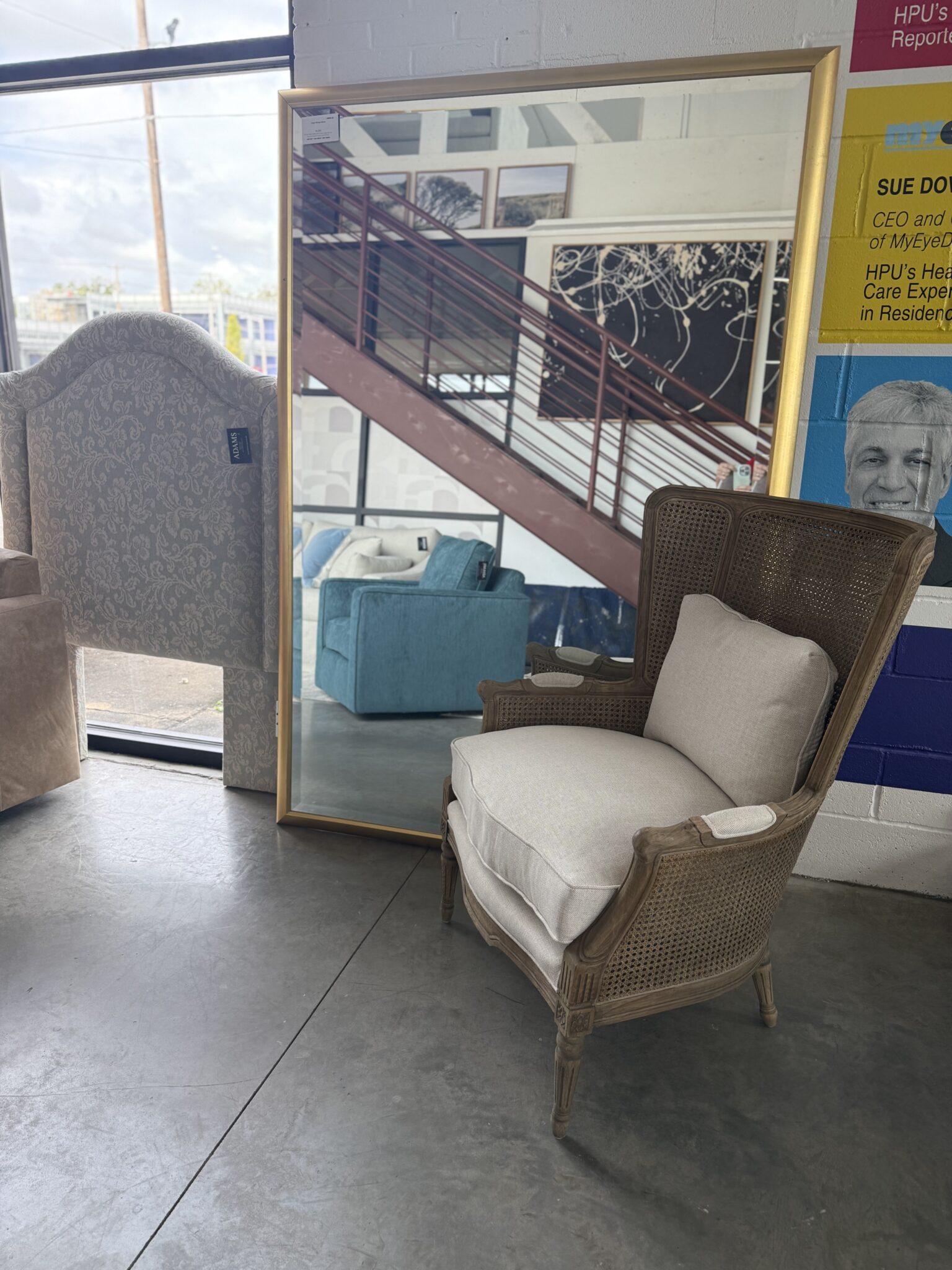 Cane-back armchair with gold mirror